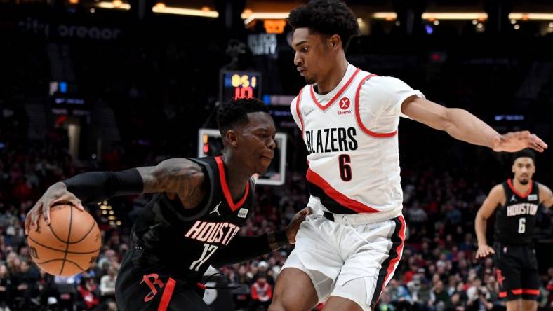 Mar 25, 2022; Portland, Oregon, USA; Houston Rockets guard Dennis Schroder (17) tries to get past Portland Trail Blazers guard Keon Johnson (6) during the second half of the game at Moda Center. The Rockets won 125-106. Mandatory Credit: Steve Dykes-USA TODAY Sports