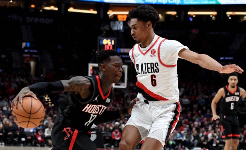 Mar 25, 2022; Portland, Oregon, USA; Houston Rockets guard Dennis Schroder (17) tries to get past Portland Trail Blazers guard Keon Johnson (6) during the second half of the game at Moda Center. The Rockets won 125-106. Mandatory Credit: Steve Dykes-USA TODAY Sports