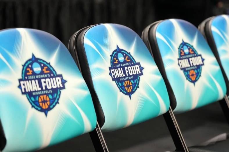 Apr 3, 2022; Minneapolis, MN, USA; The NCAA Final Four logo on seat cushions on the team benches before the championship game between the UConn Huskies and the South Carolina Gamecocks at Target Center. Mandatory Credit: Kirby Lee-USA TODAY Sports