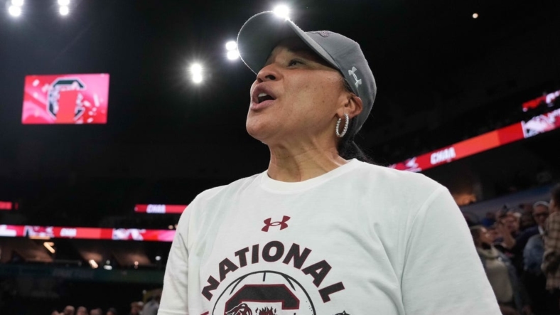 Apr 3, 2022; Minneapolis, MN, USA; South Carolina Gamecocks coach Dawn Staley celebrates after the Final Four championship game of the women's college basketball NCAA Tournament against the UConn Huskies at Target Center. South Carolina defeated UConn 64-49. Mandatory Credit: Kirby Lee-USA TODAY Sports