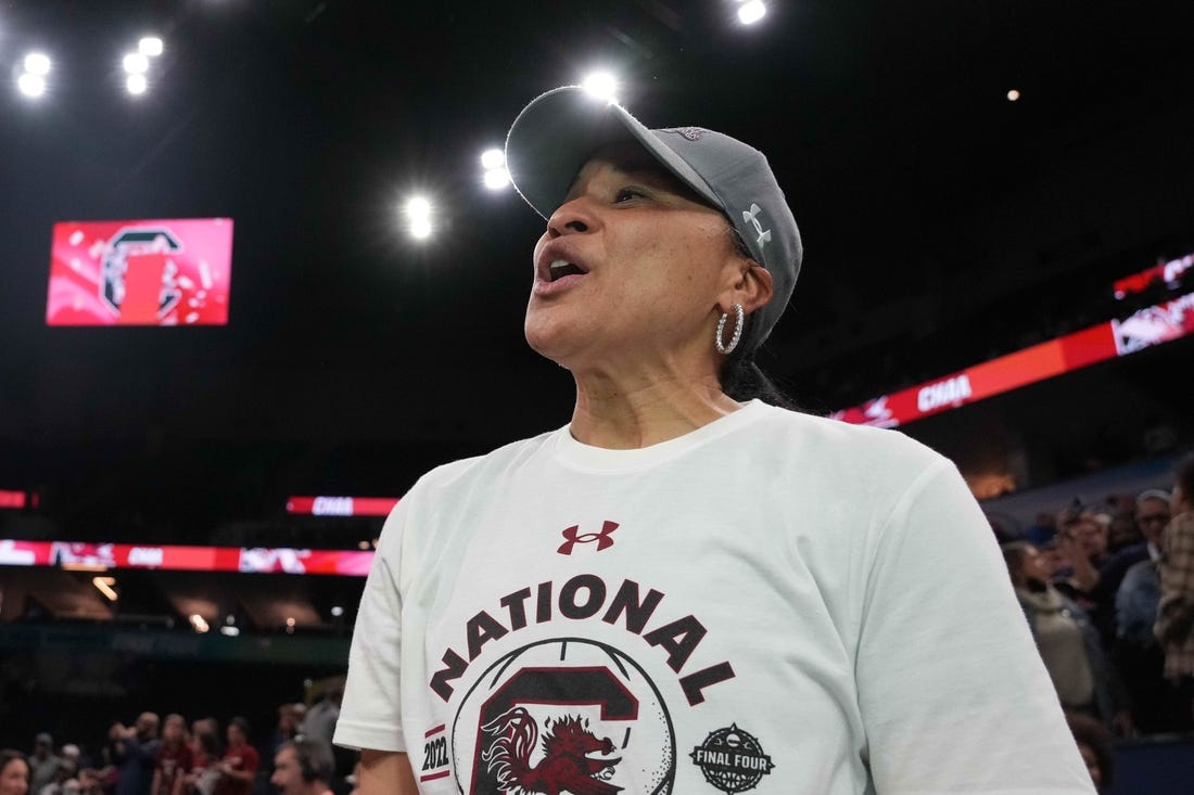 Apr 3, 2022; Minneapolis, MN, USA; South Carolina Gamecocks coach Dawn Staley celebrates after the Final Four championship game of the women's college basketball NCAA Tournament against the UConn Huskies at Target Center. South Carolina defeated UConn 64-49. Mandatory Credit: Kirby Lee-USA TODAY Sports