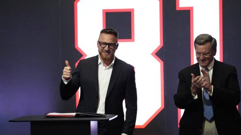 Apr 7, 2022; Chicago, Illinois, USA; The Chicago Blackhawks honor former Hawk Marian Hossa, (left) with Blackhawks Chairman Rock Wirtz, (right) at a ceremony where he signed a one day contract to retire as Blackhawk at United Center. Mandatory Credit: David Banks-USA TODAY Sports