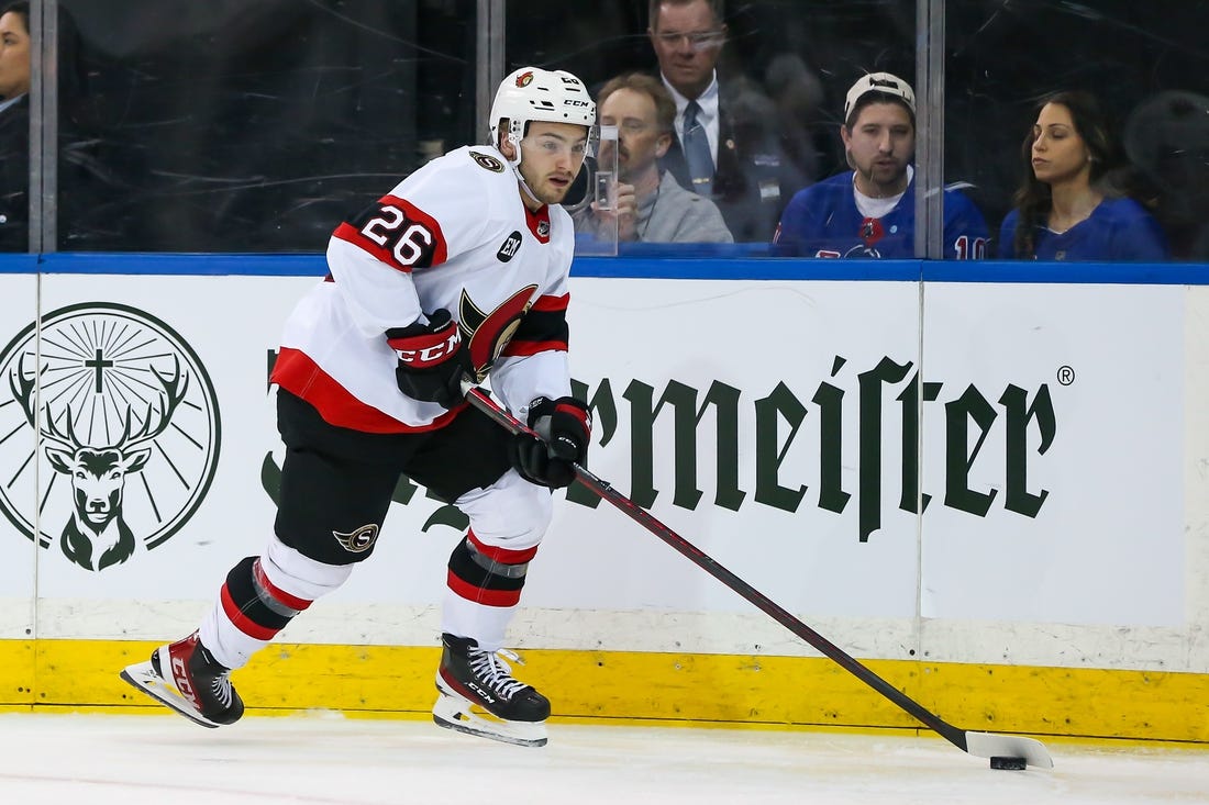 Apr 9, 2022; New York, New York, USA; Ottawa Senators defenseman Erik Brannstrom (26) controls the puck against New York Rangers during the second period at Madison Square Garden. Mandatory Credit: Tom Horak-USA TODAY Sports