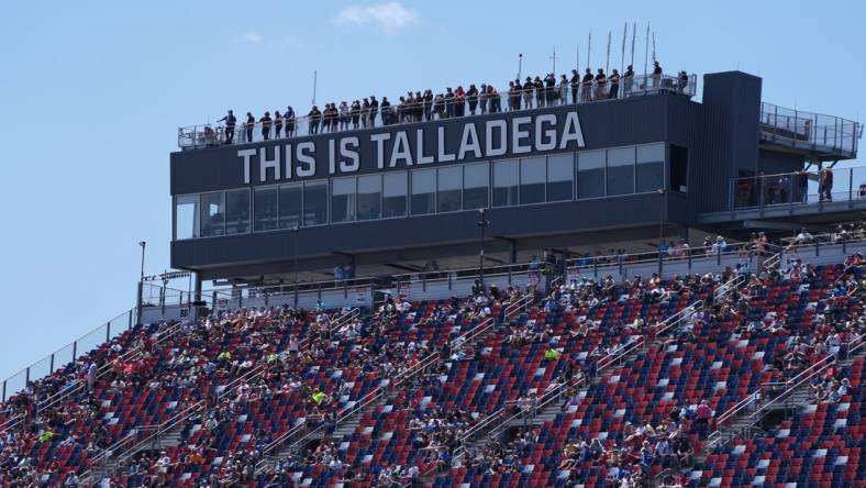 Apr 23, 2022; Talladega, Alabama, USA; Driver spotters stand atop of the grand stand press box during the General Tire 200 at Talladega Superspeedway. Mandatory Credit: Jasen Vinlove-USA TODAY Sports