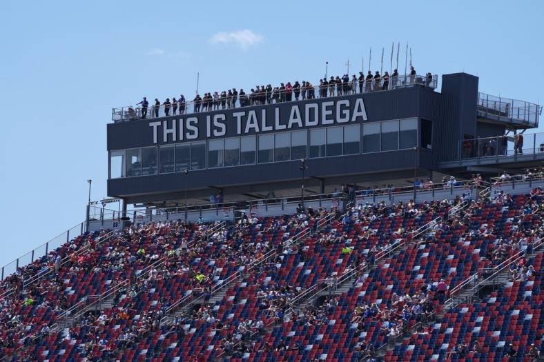 Apr 23, 2022; Talladega, Alabama, USA; Driver spotters stand atop of the grand stand press box during the General Tire 200 at Talladega Superspeedway. Mandatory Credit: Jasen Vinlove-USA TODAY Sports