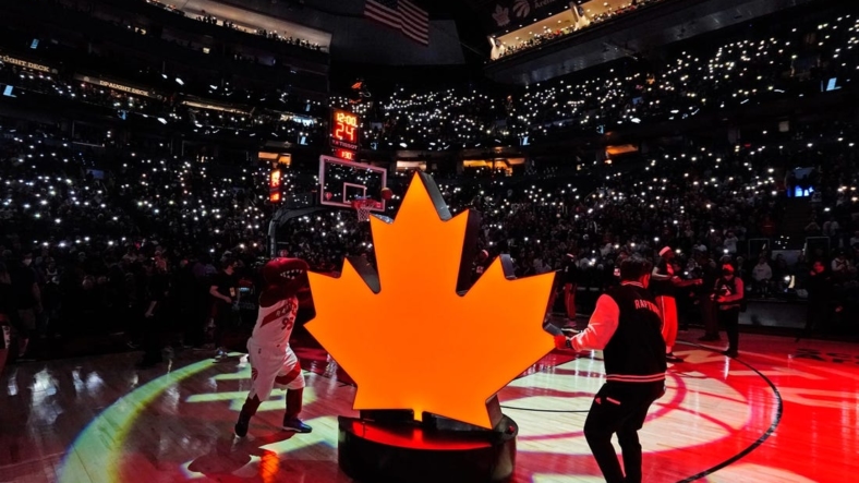 Apr 20, 2022; Toronto, Ontario, CAN; A view of the Toronto Raptors fans Light Up the North routine during player introductions of game three of the first round for the 2022 NBA playoffs against the Philadelphia 76ers at Scotiabank Arena. Mandatory Credit: John E. Sokolowski-USA TODAY Sports
