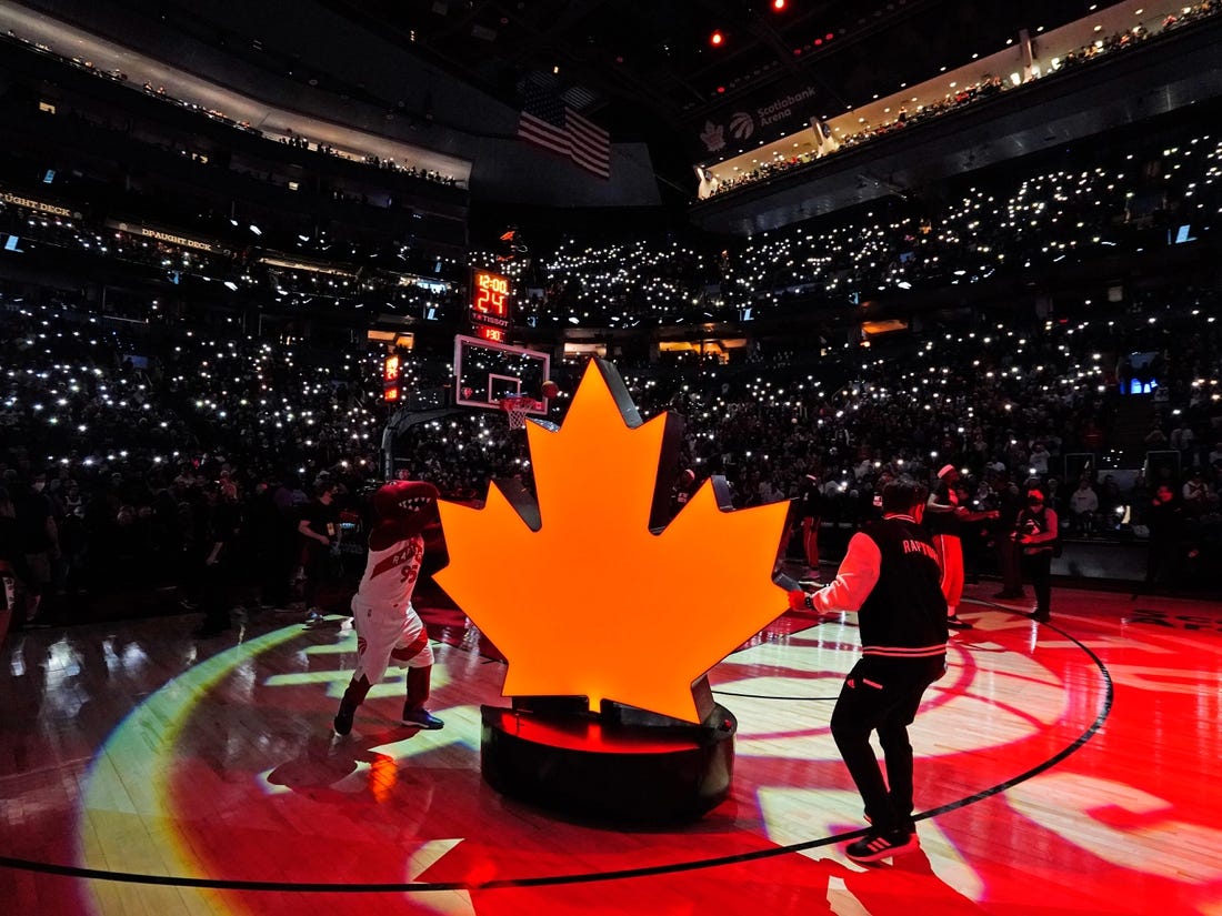 Apr 20, 2022; Toronto, Ontario, CAN; A view of the Toronto Raptors fans Light Up the North routine during player introductions of game three of the first round for the 2022 NBA playoffs against the Philadelphia 76ers at Scotiabank Arena. Mandatory Credit: John E. Sokolowski-USA TODAY Sports