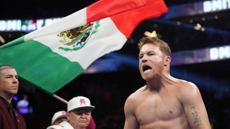 May 7, 2022; Las Vegas, Nevada, USA; Canelo Alvarez enters the arena to face Dimitry Bivol (not pictured) in their light heavyweight championship bout at T-Mobile Arena. Mandatory Credit: Joe Camporeale-USA TODAY Sports