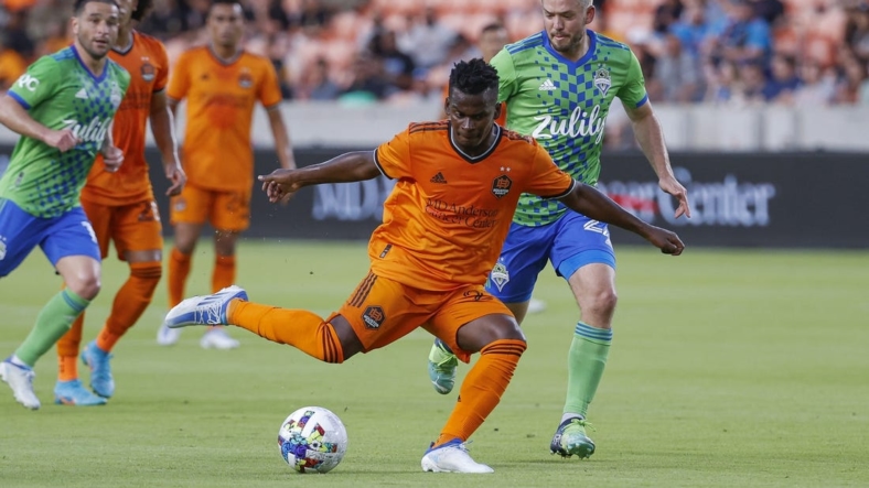 May 18, 2022; Houston, Texas, USA; Houston Dynamo FC forward Darwin Quintero (23) kicks the ball during the first half against the Seattle Sounders FC at PNC Stadium. Mandatory Credit: Troy Taormina-USA TODAY Sports
