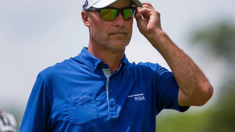 Chris DiMarco puts his sunglasses on while walking the 8th fairway during the second round of the U.S. Senior Open Friday, June 28, 2019 at Warren Golf Course in South Bend.

U S Senior Open Second Round