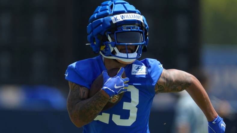 Jun 3, 2022; Thousand Oaks, CA, USA; Los Angeles Rams running back Kyren Williams (23) carries the ball during organized team activities at California Lutheran University. Mandatory Credit: Kirby Lee-USA TODAY Sports