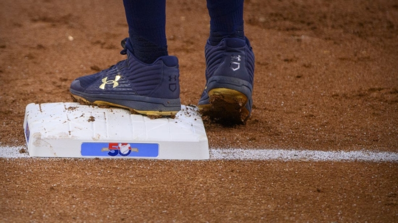 Jun 5, 2022; Arlington, Texas, USA; A view of the first base and the Rangers 50 year logo during the game between the Texas Rangers and the Seattle Mariners at Globe Life Field. Mandatory Credit: Jerome Miron-USA TODAY Sports