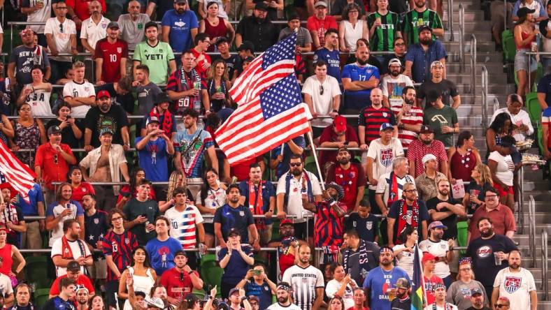 Fans wave American flags during United States men's national team soccer match against Grenada at Q2 Stadium in Austin, Texas on June 10, 2022.

Aem Usmnt Vs Grenada 061022 19