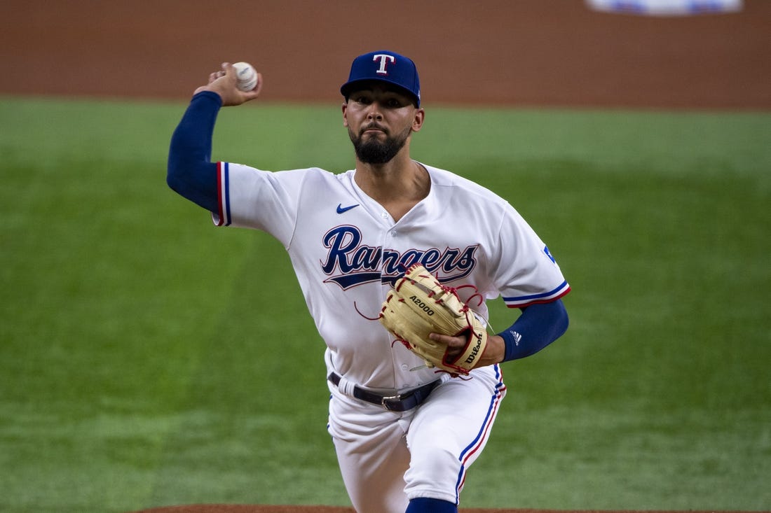 Jun 15, 2022; Arlington, Texas, USA; Texas Rangers starting pitcher Tyson Miller (76) pitches against the Houston Astros during the first inning at Globe Life Field. Mandatory Credit: Jerome Miron-USA TODAY Sports