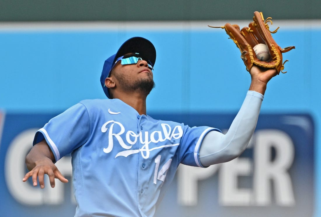 Jun 25, 2022; Kansas City, Missouri, USA; Kansas City Royals right fielder Edward Olivares (14) catches a fly ball in foul territory during the third inning against the Oakland Athletics at Kauffman Stadium. Mandatory Credit: Peter Aiken-USA TODAY Sports