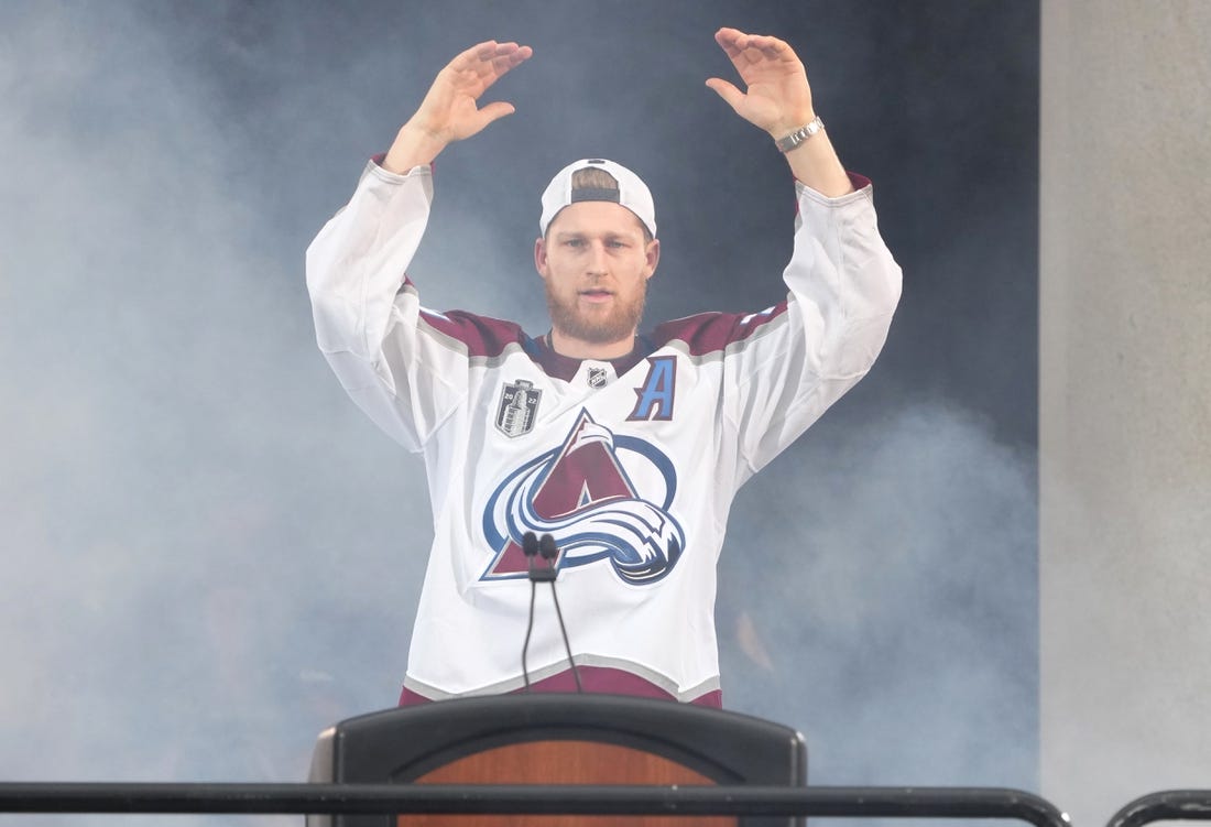 Jun 30, 2022; Denver, Colorado, USA; Colorado Avalanche center Nathan MacKinnon (29) during the Stanley Cup Championship Celebration. Mandatory Credit: Ron Chenoy-USA TODAY Sports