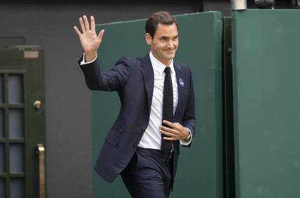 Jul 3, 2022; London, United Kingdom; On the inaugural middle Sunday for play, Wimbledon celebrates 100 years since their move to Church Road and the centenary of Centre Court. Past champions were on court for this special ceremony on day seven at All England Lawn Tennis and Croquet Club. Shown here: Roger Federer (SUI). Mandatory Credit: Susan Mullane-USA TODAY Sports