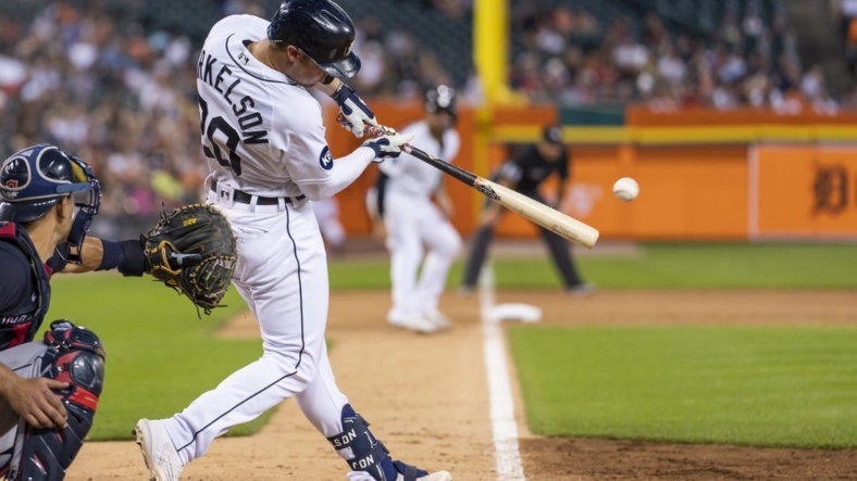 Jul 5, 2022; Detroit, Michigan, USA; Detroit Tigers first baseman Spencer Torkelson (20) grounds into a fielder's choice and gets an RBI during the sixth inning against the Cleveland Guardians at Comerica Park. Mandatory Credit: Raj Mehta-USA TODAY Sports