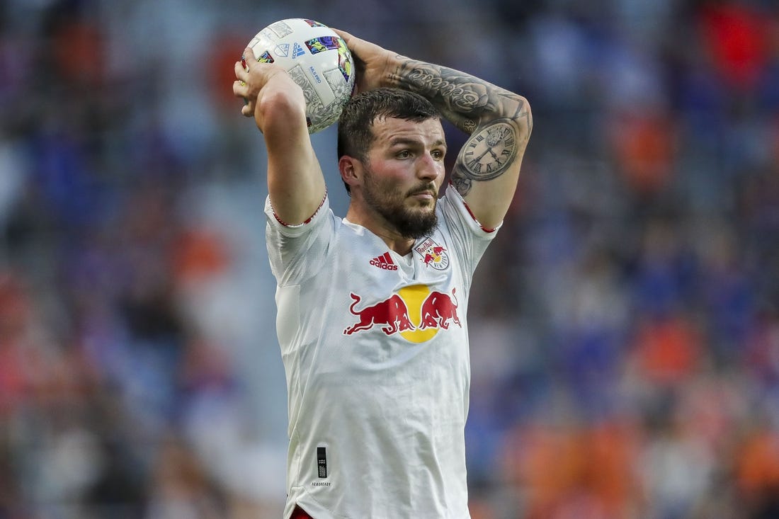 Jul 9, 2022; Cincinnati, Ohio, USA; New York Red Bulls defender Tom Edwards (7) throws in the ball against FC Cincinnati in the second half at TQL Stadium. Mandatory Credit: Katie Stratman-USA TODAY Sports