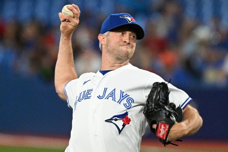 Jul 13, 2022; Toronto, Ontario, CAN; Toronto Blue Jays relief pitcher Trevor Richards (33) throws a pitch against the Philadelphia Phillies in the ninth inning at Rogers Centre. Mandatory Credit: Dan Hamilton-USA TODAY Sports