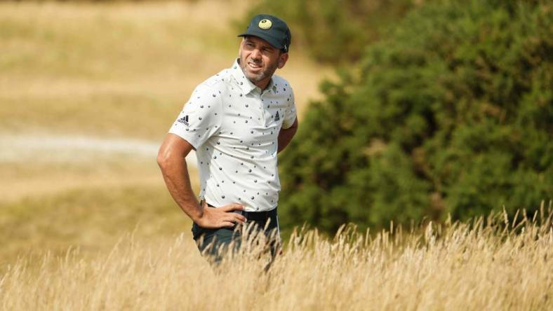 Jul 16, 2022; St. Andrews, SCT; Sergio Garcia reacts after his second shot on the 13th hole during the third round of the 150th Open Championship golf tournament. Mandatory Credit: Rob Schumacher-USA TODAY Sports