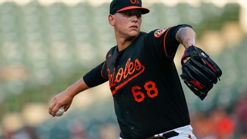 Jul 22, 2022; Baltimore, Maryland, USA;  Baltimore Orioles starting pitcher Tyler Wells (68) throws a first inning pitch against the New York Yankees at Oriole Park at Camden Yards. Mandatory Credit: Tommy Gilligan-USA TODAY Sports
