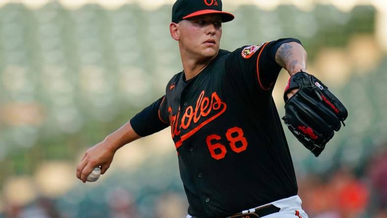 Jul 22, 2022; Baltimore, Maryland, USA;  Baltimore Orioles starting pitcher Tyler Wells (68) throws a first inning pitch against the New York Yankees at Oriole Park at Camden Yards. Mandatory Credit: Tommy Gilligan-USA TODAY Sports