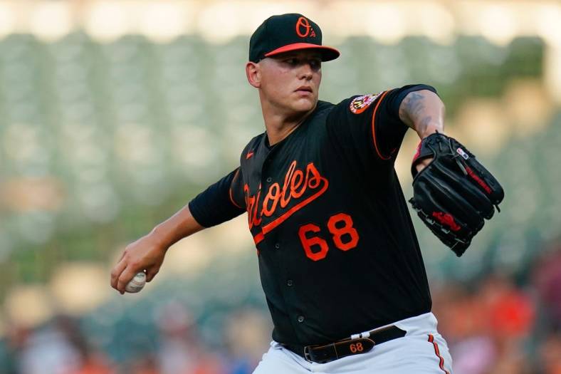 Jul 22, 2022; Baltimore, Maryland, USA;  Baltimore Orioles starting pitcher Tyler Wells (68) throws a first inning pitch against the New York Yankees at Oriole Park at Camden Yards. Mandatory Credit: Tommy Gilligan-USA TODAY Sports