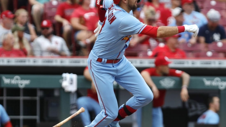 Jul 23, 2022; Cincinnati, Ohio, USA; St. Louis Cardinals center fielder Dylan Carlson (3) runs after hitting a double against the Cincinnati Reds during the third inning at Great American Ball Park. Mandatory Credit: David Kohl-USA TODAY Sports