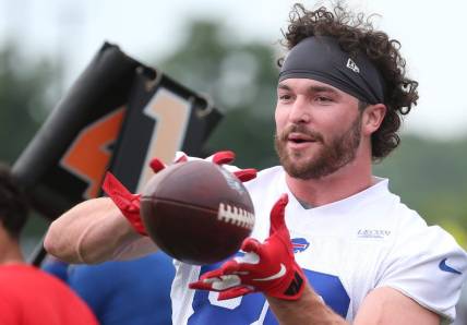 Tight end Dawson Knox eyes in a pass on the opening day of the Buffalo Bills training camp at St. John Fisher University in Rochester Sunday, July 24, 2022.

Sd 072422 Bills Camp 22 Spts