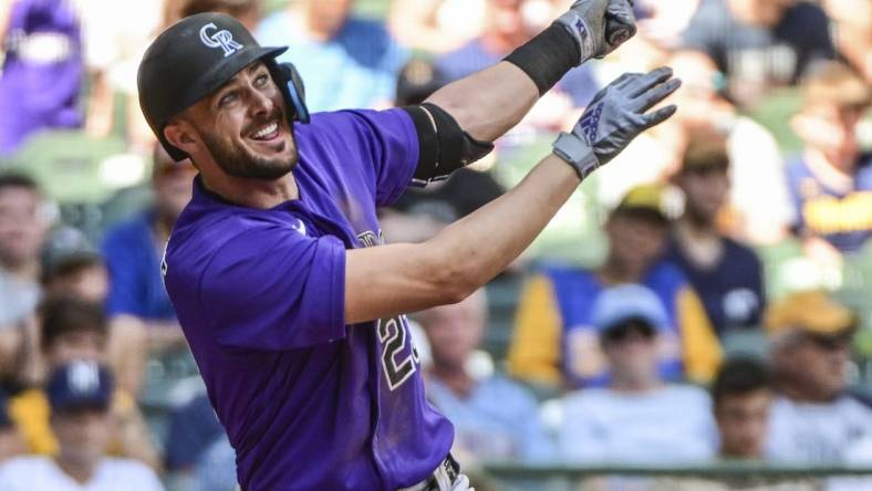 Jul 24, 2022; Milwaukee, Wisconsin, USA; Colorado Rockies left fielder Kris Bryant (23) watches after hitting a 2-run home run in the fifth inning against the Milwaukee Brewers at American Family Field. Mandatory Credit: Benny Sieu-USA TODAY Sports