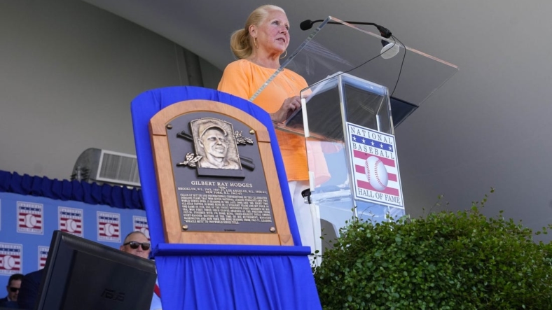 Jul 24, 2022; Cooperstown, New York, USA; Irene Hodges, daughter of Gil Hodges, speaks on behalf of Hall of Fame Posthumous inductee Gil Hodges during the Baseball Hall of Fame Induction Ceremony at Clark Sports Center. Mandatory Credit: Gregory Fisher-USA TODAY Sports