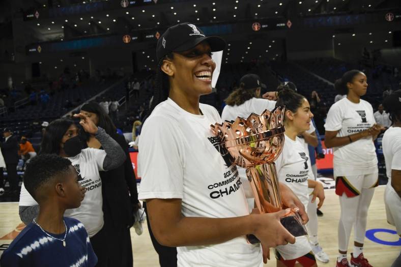 Jul 26, 2022; Chicago, IL, USA;  Las Vegas Aces forward A'ja Wilson (22) with the trophy after they won the Commissioners Cup-Championships with a victory over the Chicago Sky 93-83, at Wintrust Arena. Mandatory Credit: Matt Marton-USA TODAY Sports