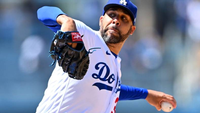 Jul 27, 2022; Los Angeles, California, USA; Los Angeles Dodgers relief pitcher David Price (33) throws a scoreless ninth against the Washington Nationals at Dodger Stadium. Mandatory Credit: Jayne Kamin-Oncea-USA TODAY Sports