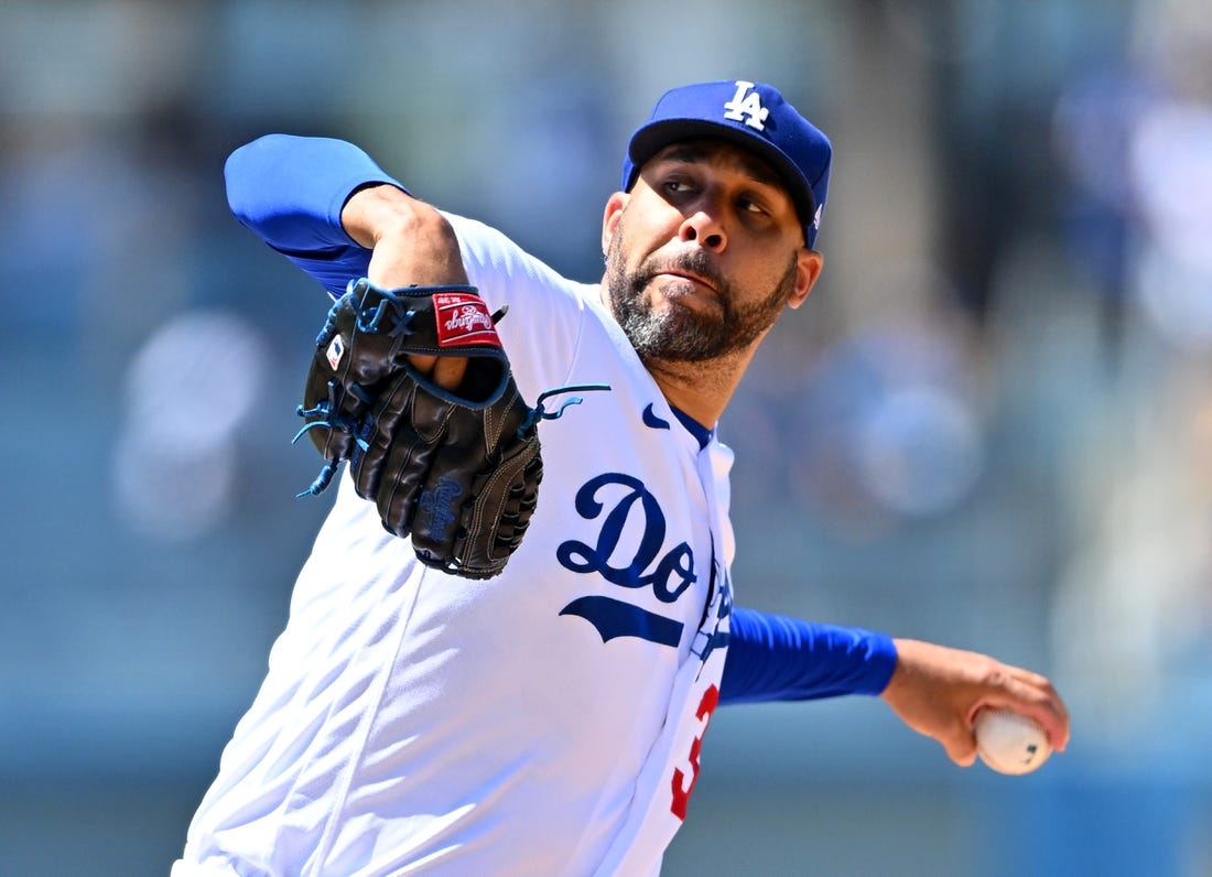 Jul 27, 2022; Los Angeles, California, USA; Los Angeles Dodgers relief pitcher David Price (33) throws a scoreless ninth against the Washington Nationals at Dodger Stadium. Mandatory Credit: Jayne Kamin-Oncea-USA TODAY Sports