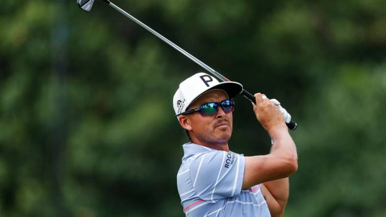 Rickie Fowler tees on the ninth hole during Round 2 of the Rocket Mortgage Classic at the Detroit Golf Club in Detroit on Friday, July 29, 2022.