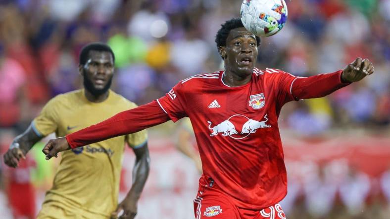 Jul 30, 2022; Harrison, New Jersey, USA; New York Red Bulls defender Hassan Ndam (98) plays the ball against FC Barcelona during the second half at Red Bull Arena. Mandatory Credit: Vincent Carchietta-USA TODAY Sports