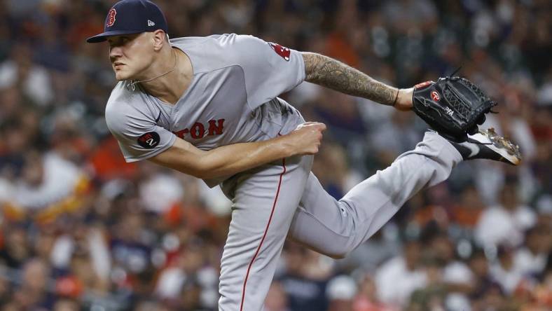 Aug 1, 2022; Houston, Texas, USA; Boston Red Sox relief pitcher Tanner Houck (89) delivers a pitch during the ninth inning against the Houston Astros at Minute Maid Park. Mandatory Credit: Troy Taormina-USA TODAY Sports