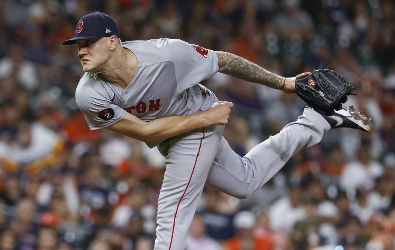 Aug 1, 2022; Houston, Texas, USA; Boston Red Sox relief pitcher Tanner Houck (89) delivers a pitch during the ninth inning against the Houston Astros at Minute Maid Park. Mandatory Credit: Troy Taormina-USA TODAY Sports