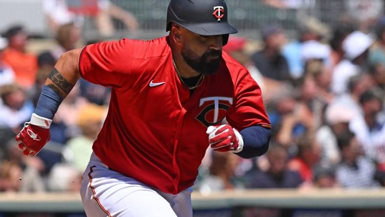 Aug 3, 2022; Minneapolis, Minnesota, USA; Minnesota Twins catcher Sandy Leon (39) heads to first on his two-run RBI double against the Detroit Tigers during the second inning at Target Field. Mandatory Credit: Nick Wosika-USA TODAY Sports