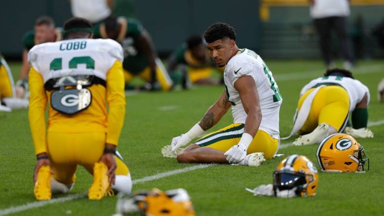 Green Bay Packers wide receiver Allen Lazard (13) stretches during Packers Family Night at Lambeau Field on Aug. 5, 2022, in Green Bay, Wis.

Gpg Familynight 080522 Sk39