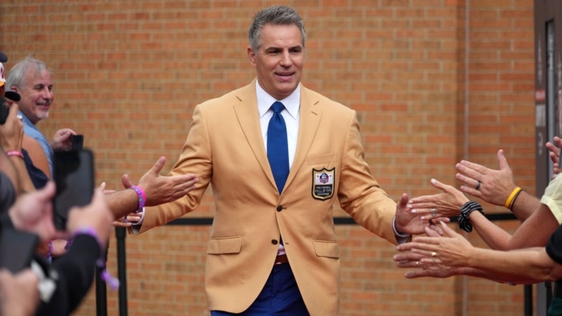 Aug 6, 2022; Canton, OH, USA; Kurt Warner arrives on the red carpet during the Pro Football Hall of Fame Class of 2022 Enshrinement at Tom Benson Hall of Fame Stadium. Mandatory Credit: Kirby Lee-USA TODAY Sports