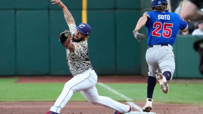 Columbus Clippers first baseman Bobby Bradley (44) stretches to get the force out on St. Paul Saints shortstop Elliot Soto (25) during the Minor League Baseball game at Huntington Park in Columbus on May 11, 2022.

Milb St Paul At Columbus