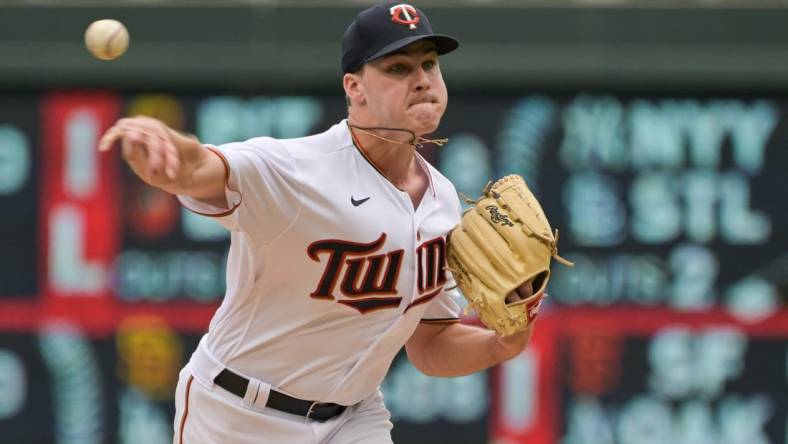 Aug 7, 2022; Minneapolis, Minnesota, USA; Minnesota Twins starting pitcher Cole Sands (77) throws a pitch against the Toronto Blue Jays during the sixth inning at Target Field. Mandatory Credit: Jeffrey Becker-USA TODAY Sports