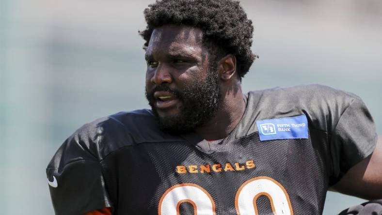 Aug 7, 2022; Cincinnati OH, USA; Cincinnati Bengals defensive tackle D.J. Reader (98) walks on the field during training camp at Kettering Health Practice Fields. Mandatory Credit: Katie Stratman-USA TODAY Sports