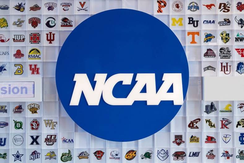 University logos cover a wall in the lobby of NCAA headquarters Thursday, Feb. 25, 2021, in Indianapolis.

Ncaa National Collegiate Athletics Association Office Headquarters In Indianapolis Feb 25 2021