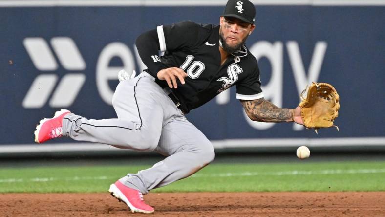 Aug 10, 2022; Kansas City, Missouri, USA;  Chicago White Sox third baseman Yoan Moncada (10) dives for a ground ball during the eighth inning against the Kansas City Royals at Kauffman Stadium. Mandatory Credit: Peter Aiken-USA TODAY Sports