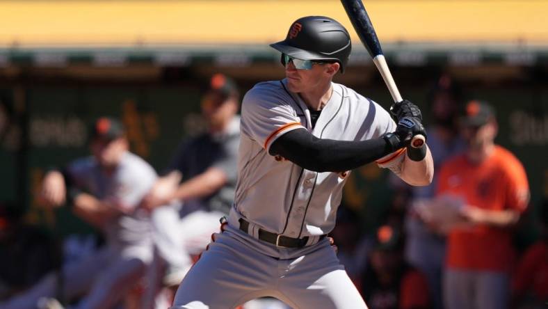 Aug 7, 2022; Oakland, California, USA; San Francisco Giants center fielder Bryce Johnson (58) bats during the ninth inning against the Oakland Athletics at RingCentral Coliseum. Mandatory Credit: Darren Yamashita-USA TODAY Sports