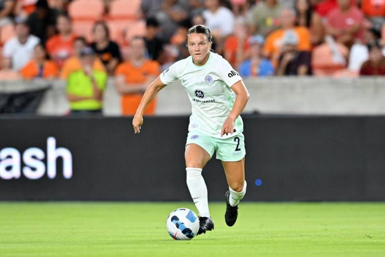 Aug 12, 2022; Houston, Texas, USA; Racing Louisville FC midfielder Lauren Milliet (2) handles the ball during the first half against the Houston Dash at PNC Stadium. Mandatory Credit: Maria Lysaker-USA TODAY Sports