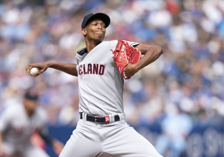 Aug 13, 2022; Toronto, Ontario, CAN; Cleveland Guardians starting pitcher Triston McKenzie (24) throws a pitch against the Toronto Blue Jays during the first inning at Rogers Centre. Mandatory Credit: Nick Turchiaro-USA TODAY Sports